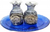 A pair of pomegranate-shaped candlesticks, made of silver-plated glass, blue, handmade