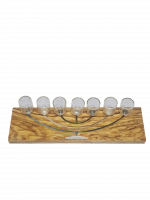 A wooden seven-candle holder with a large menorah painted on it