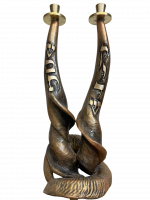 A candlestick made of intertwined antelope horns